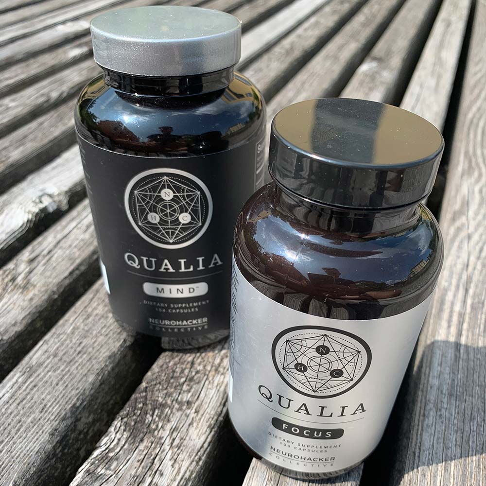 A bottle of Qualia Mind next to a bottle of Qualia Focus
