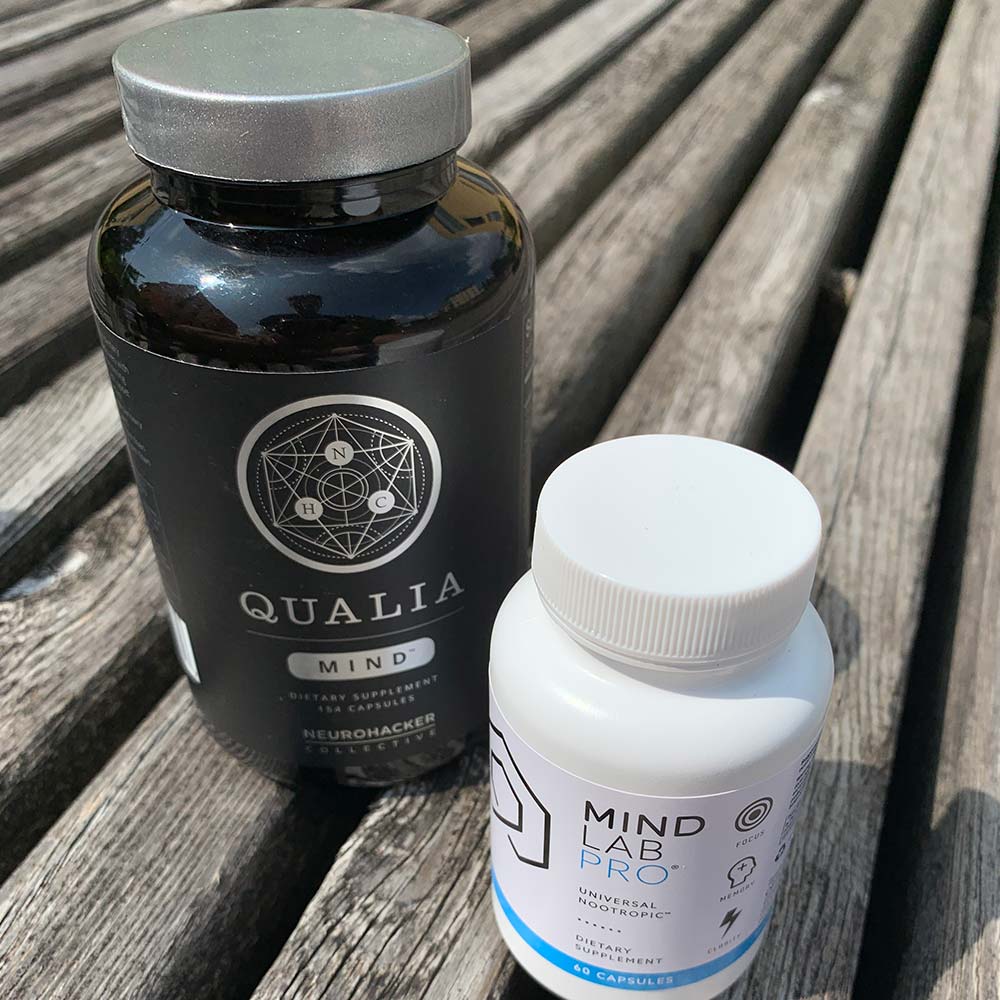 A bottle of Qualia Mind and a bottle of Mind Lab Pro