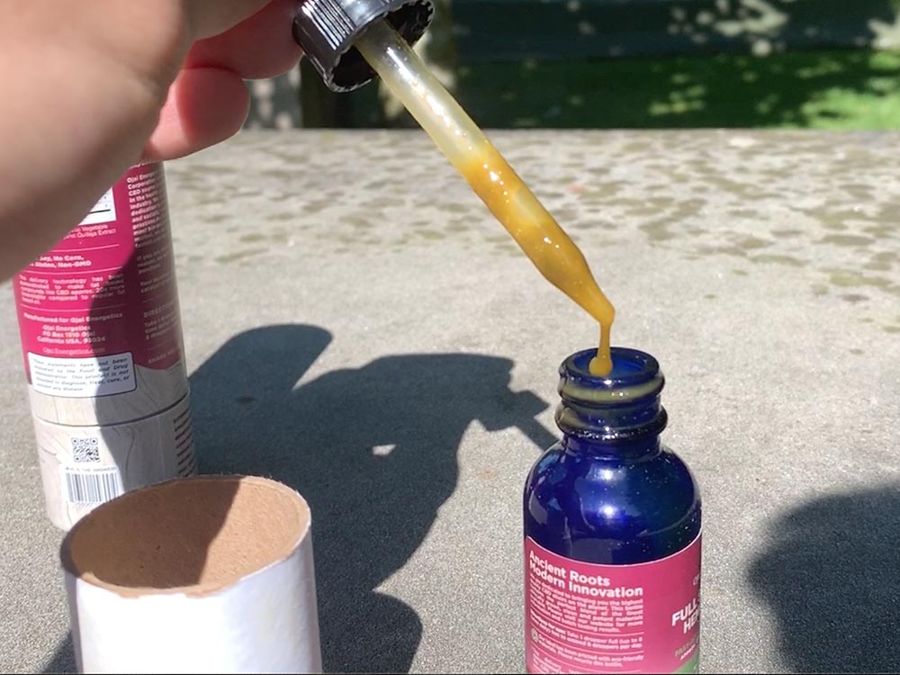 A dropper filled with Full Spectrum Hemp Elixir