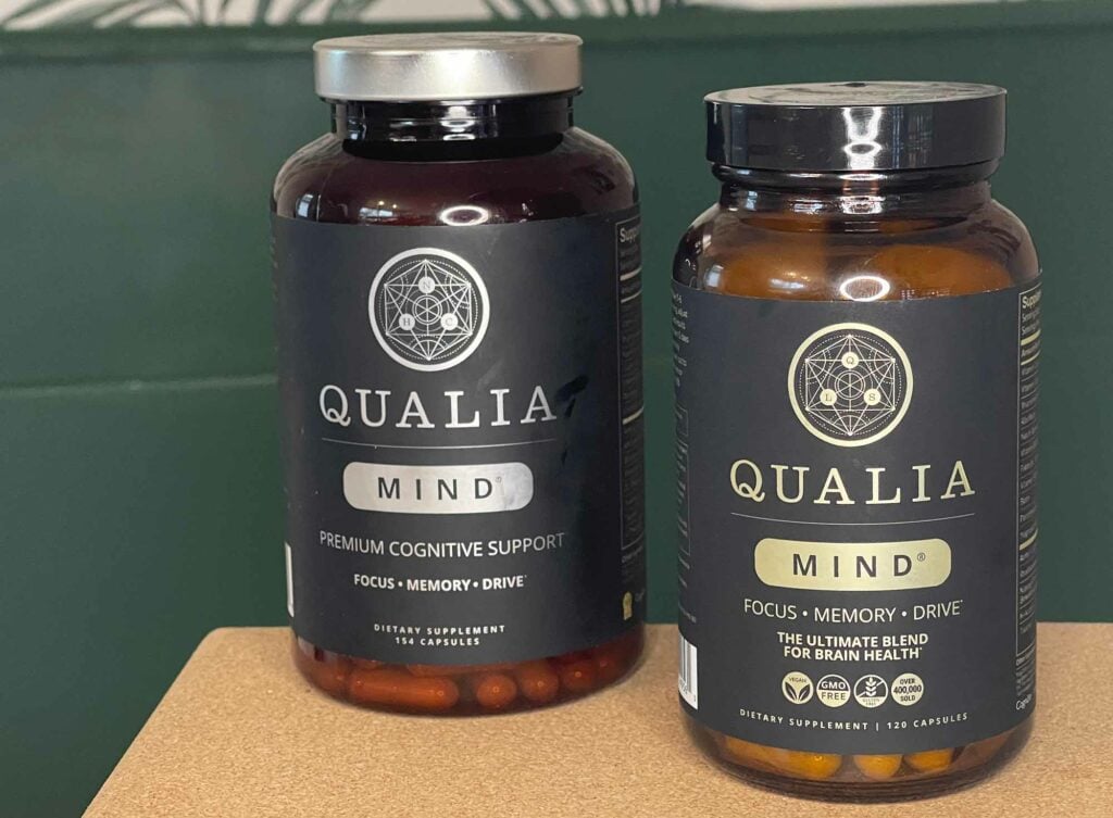 A bottle of Qualia Mind on the left and a bottle of Qualia Mind 2.0 2024 on the right
