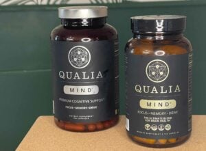 A bottle of Qualia Mind on the left and a bottle of Qualia Mind 2.0 2024 on the right