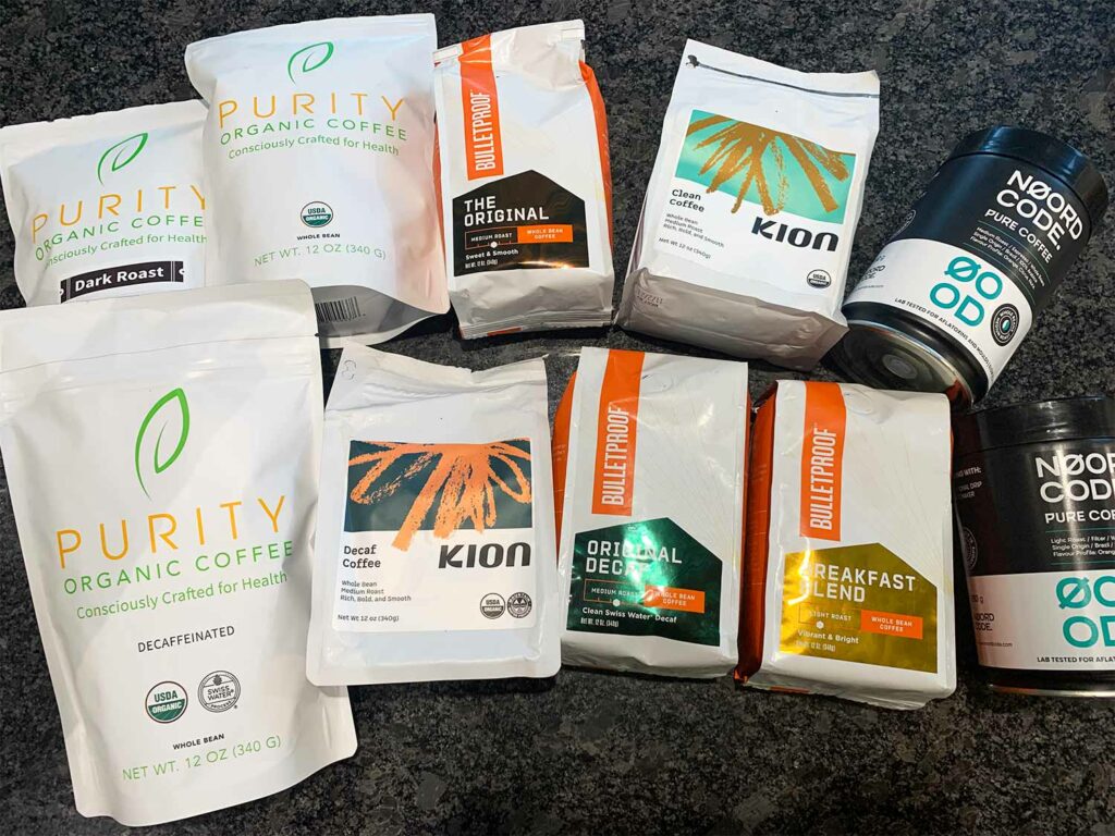 Packs of Coffee from Purity, Kion, Bulletproof and NoordCode