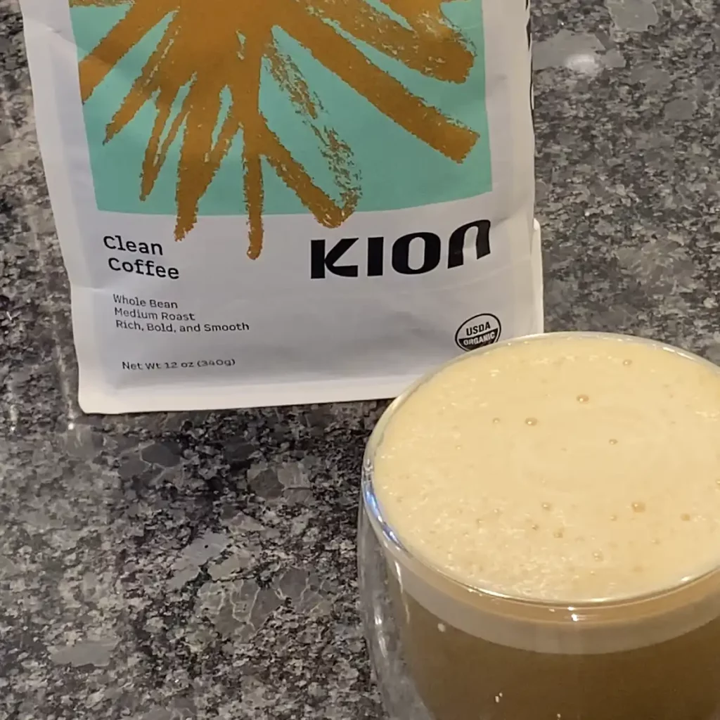 A bag of Kion clean coffee and a cup of Kion biohacking coffee