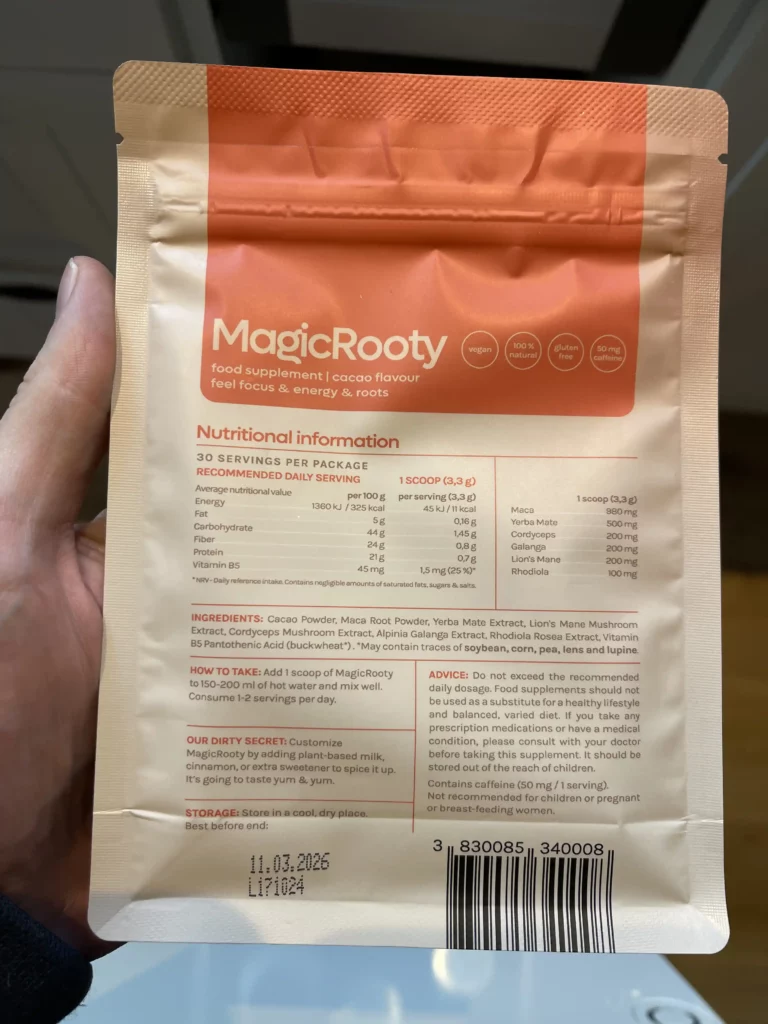 My hand holding a pack of MagicRooty showing the ingredient list